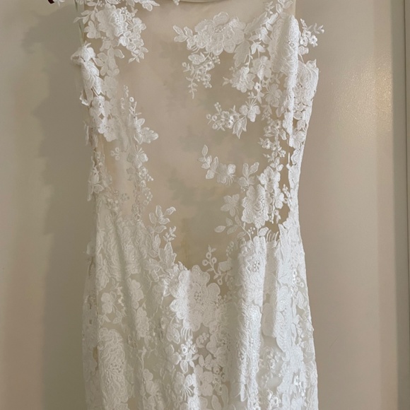 Pronovias RUA Wedding Gown: professionally cleaned,mermaid, sheer back. Size 12 - Picture 11 of 15